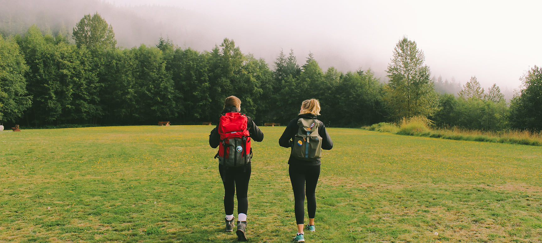 Women hiking with BC Parks Foundation patches