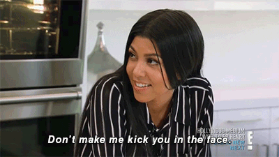 Gif of A Woman Saying Don't Make Me Kick You In The Face