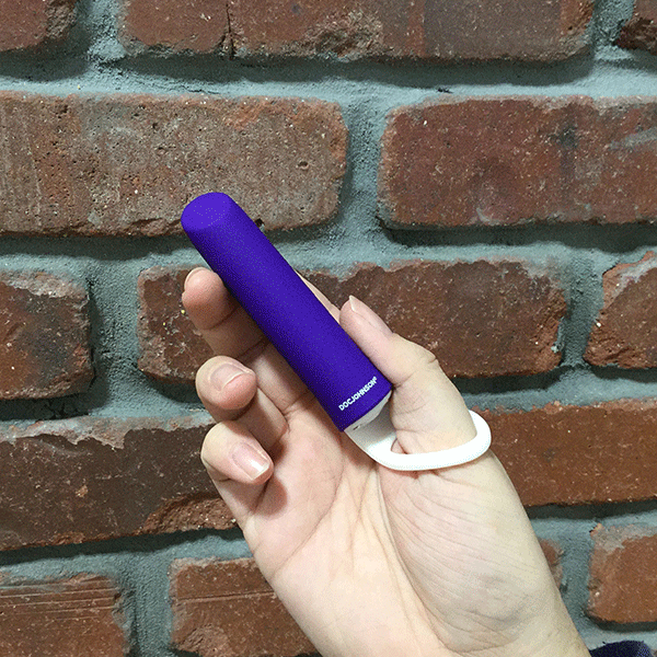 Purple iVibe Vibrator Held In Hand To Show Product Size And Using Safety Loop On Toy