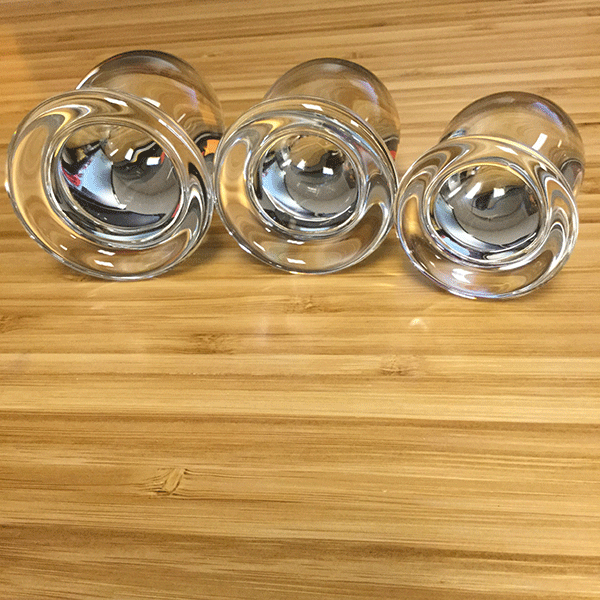 flared base of set of 3 glass butt plugs
