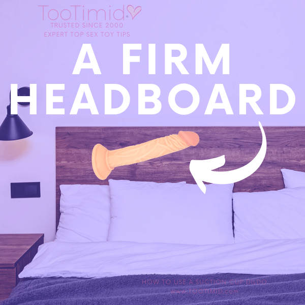Image of a suction cup dildo stuck to a firm headboard of a bed to show how you can use a suction cup dildo doggy style on the bed