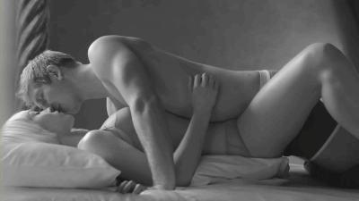 Gif of A Couple Kissing On The Bed