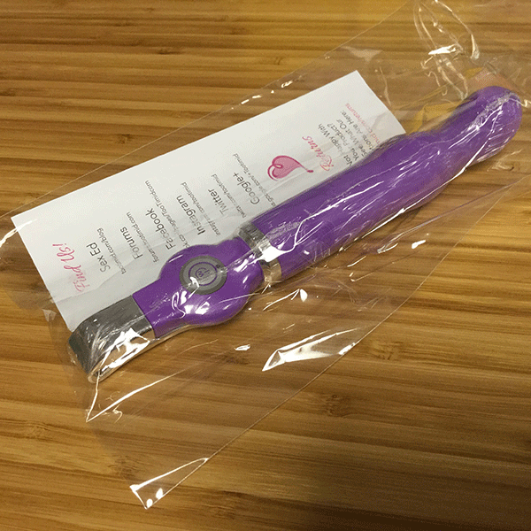 Pink bob purple rechargeable vibrator in packaging