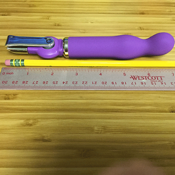 pink bob rechargeable purple vibe measurements next to ruler and pencil