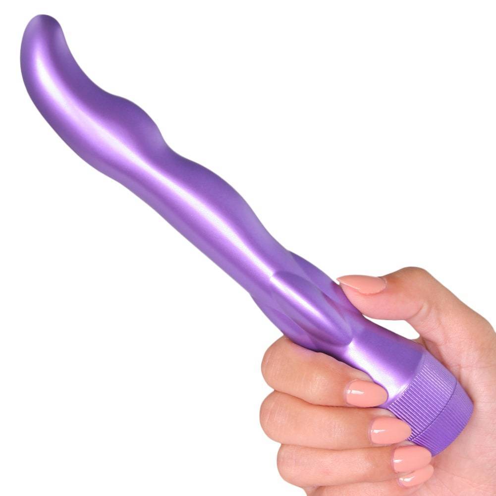 Hand holding purple gspot wavy toy