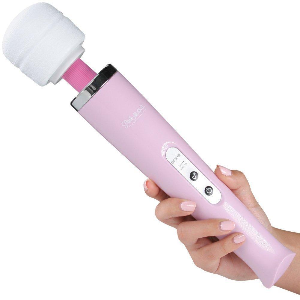 Large light pink massage wand held in hand