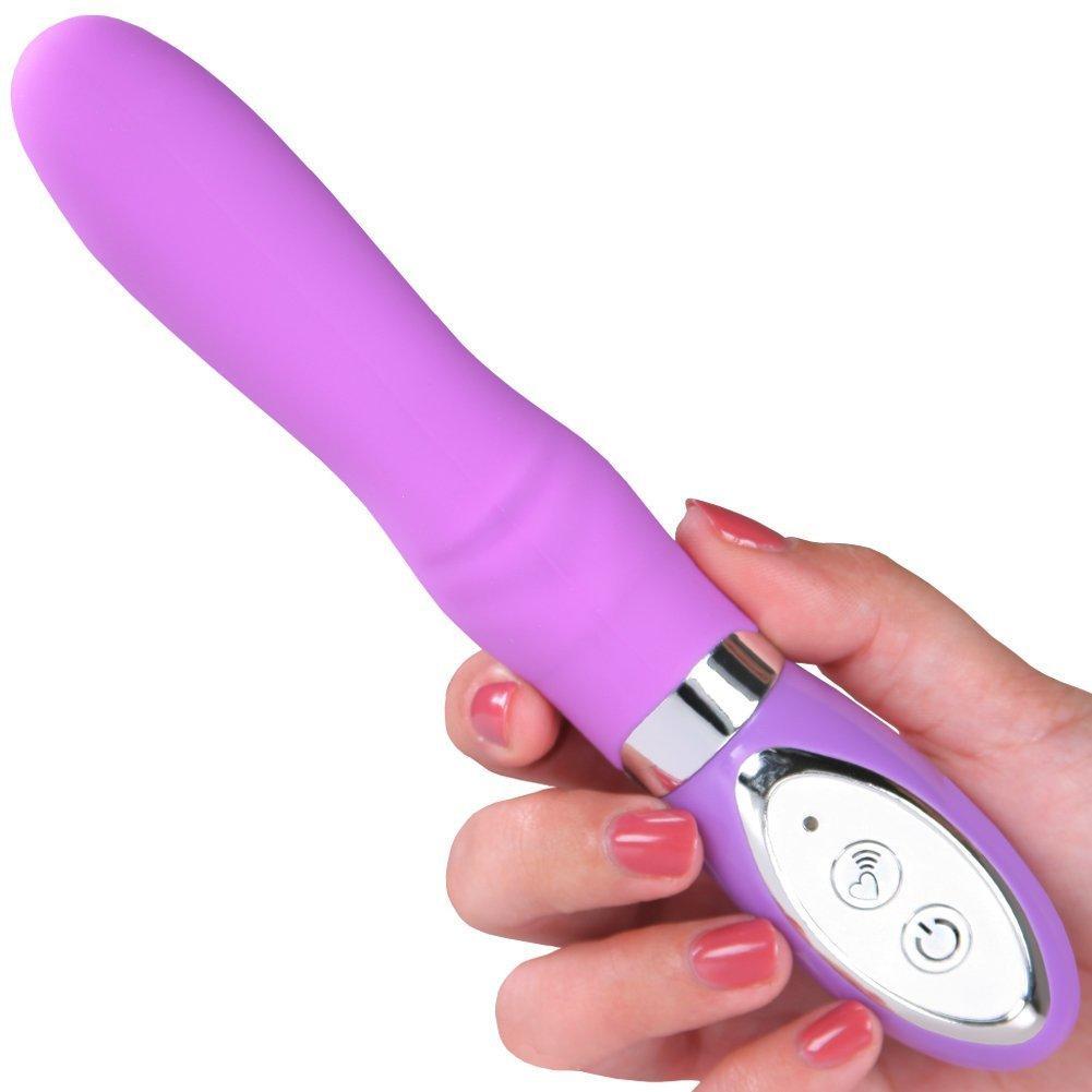 Hand holding basic silicone purple vibrator