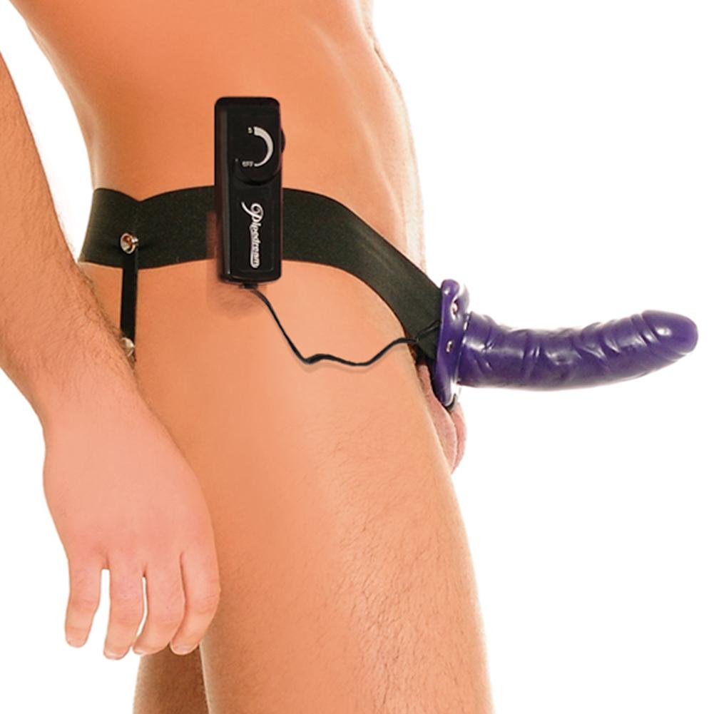 Image of male mannequin wearing purple colored hollow strap on vibrating dildo