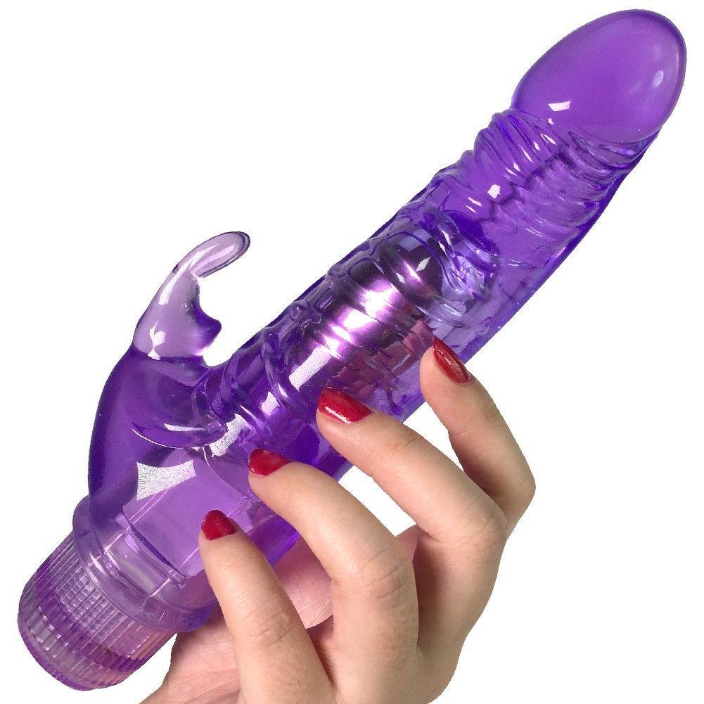 Hand holding purple vibrator