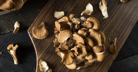 Maitake Mushroom Fruiting Body On a Wooden Board - Antioxi