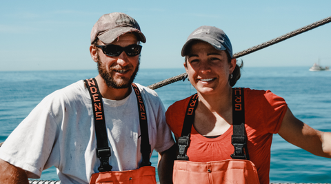 Steve and Jenn Kurian on a boat in Alaska