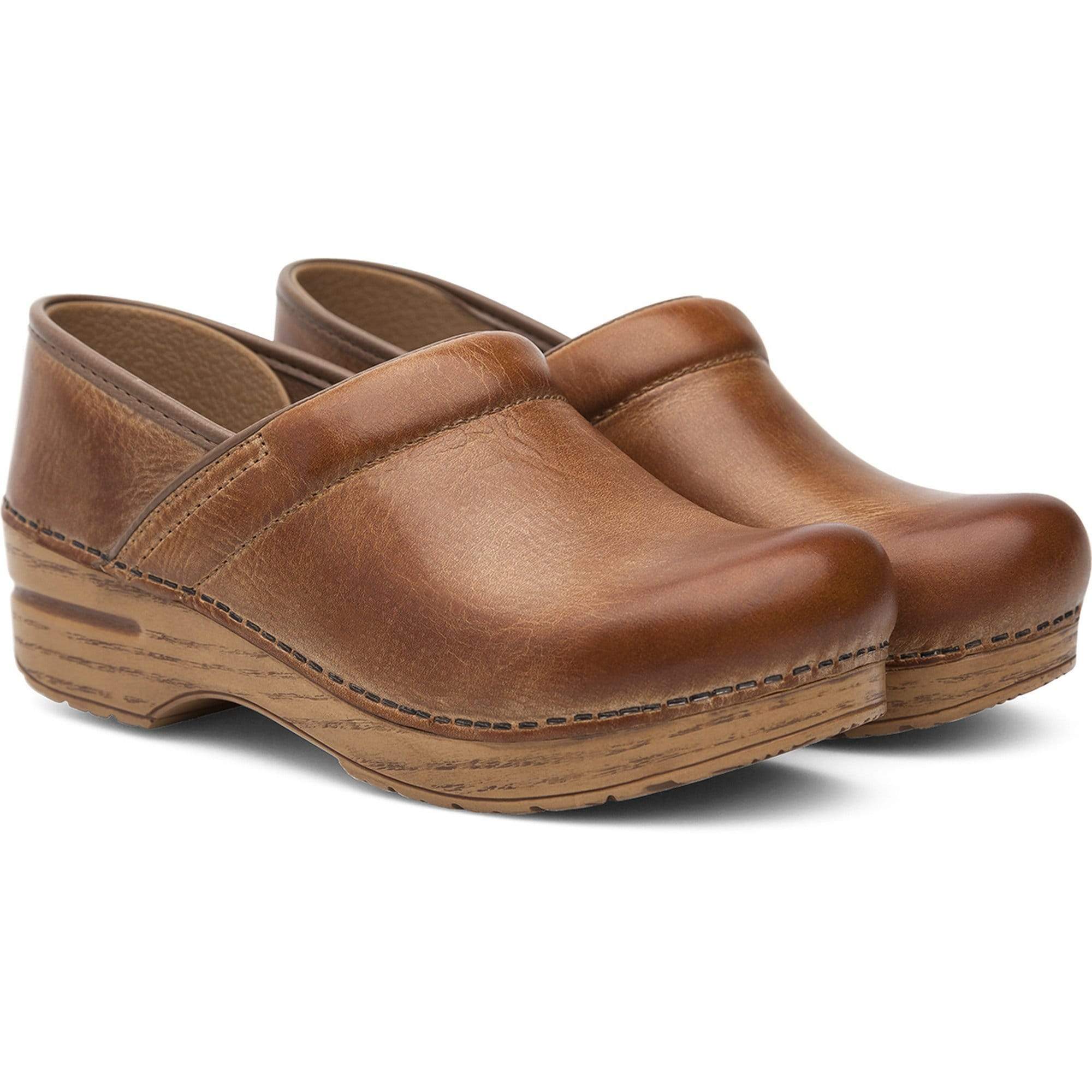 dansko clogs honey distressed