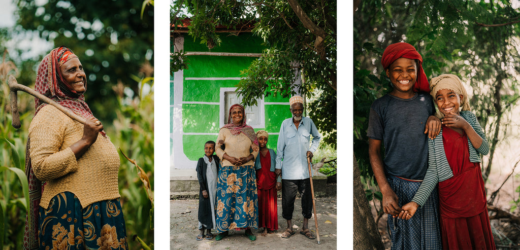 Ababech stands proudly in her garden and with her family outside their home now that they have clean water through neverthirst.