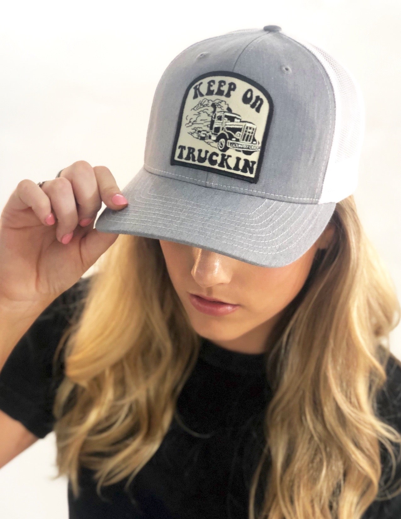 keep on truckin trucker hat