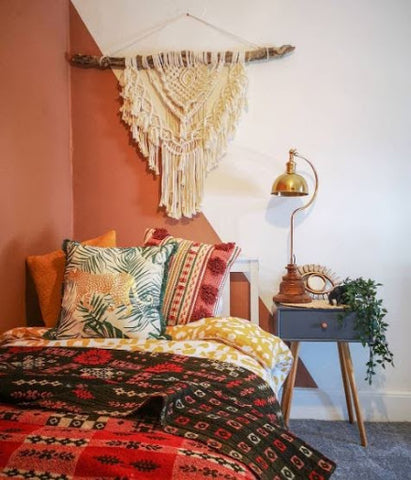 rustic red bedroom with table lamp for reading