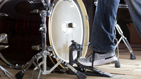man playing with single kick bass drum by GRIFFIN
