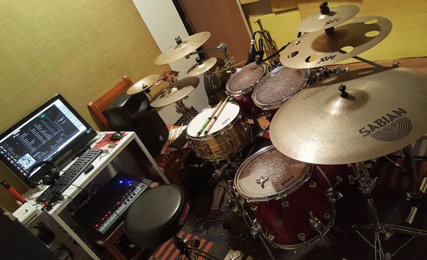 drum kit set up at a home studio