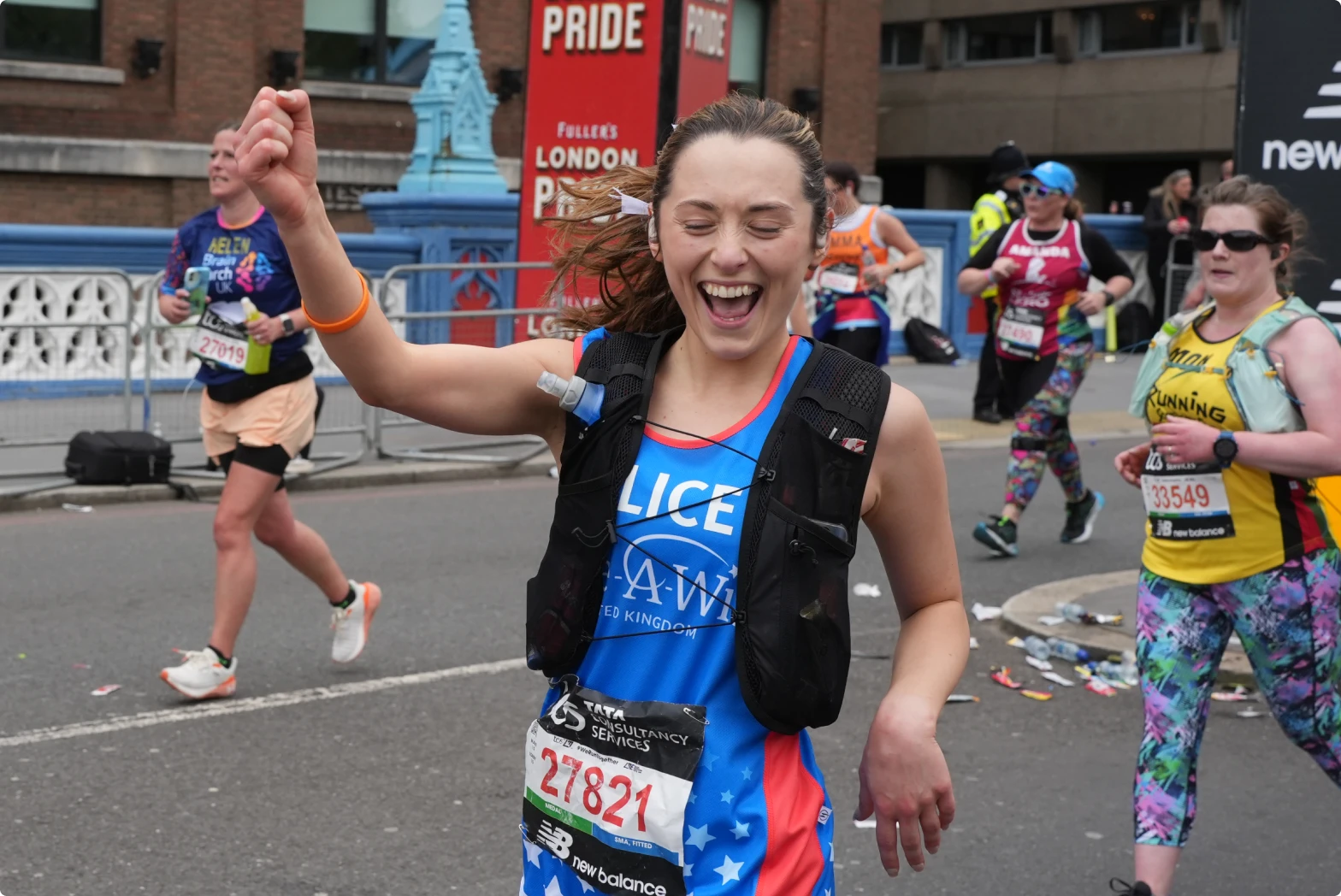 runners wearing shokz sports headphones