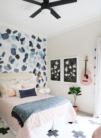 An after version of a bedroom with Large Indigo brush stroke wall decals