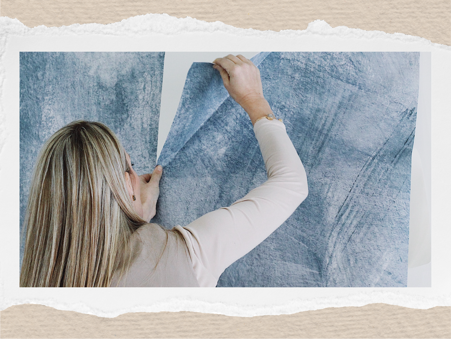 Girl removing wall murals