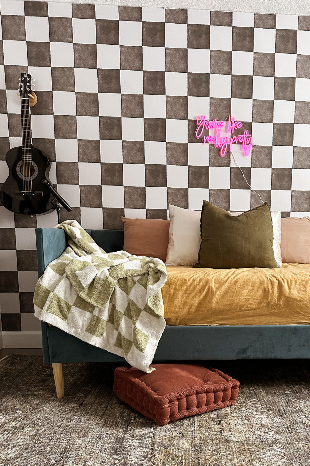 girls room with black and white checkered wallpaper