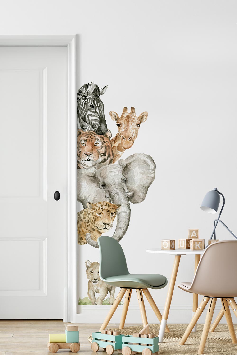 Jungle Animal Wall Decals shown framing the door of a childs playroom.