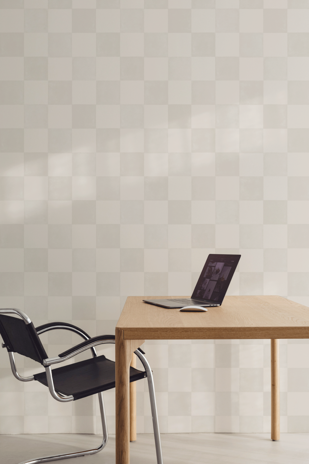 work area with checkered wallpaper