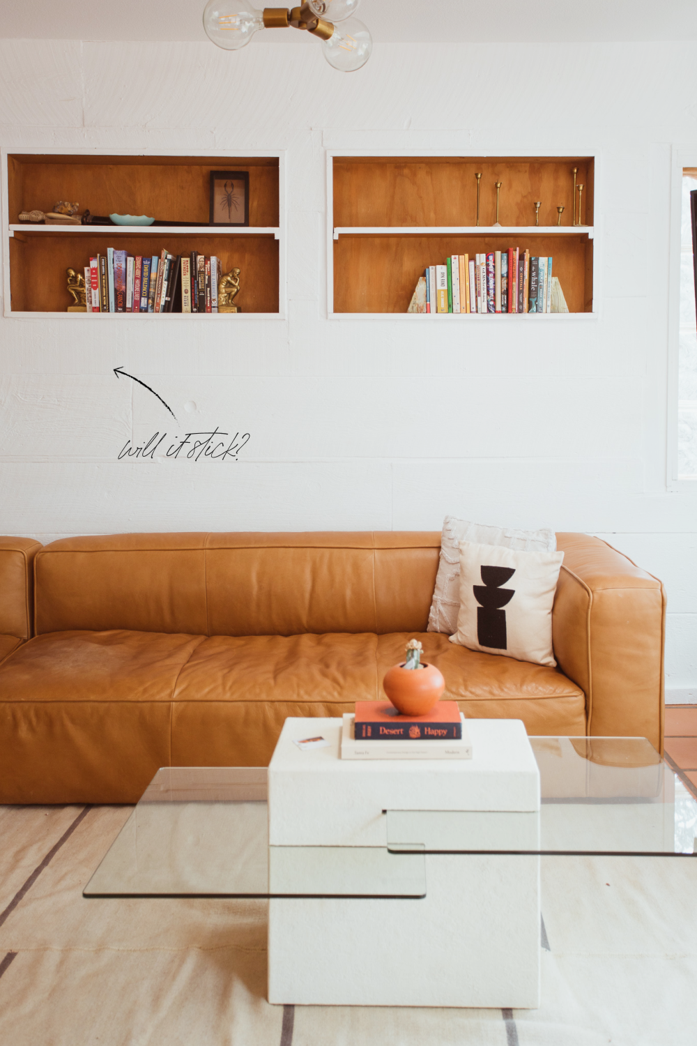 textured wall with brown couch