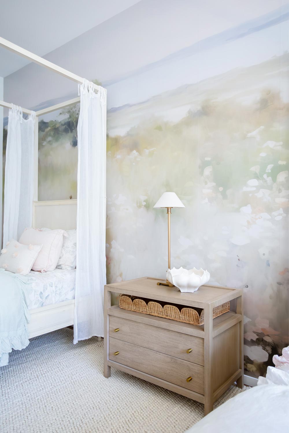 Watercolor Meadows Mural in a girls shared bedroom behind two beds.