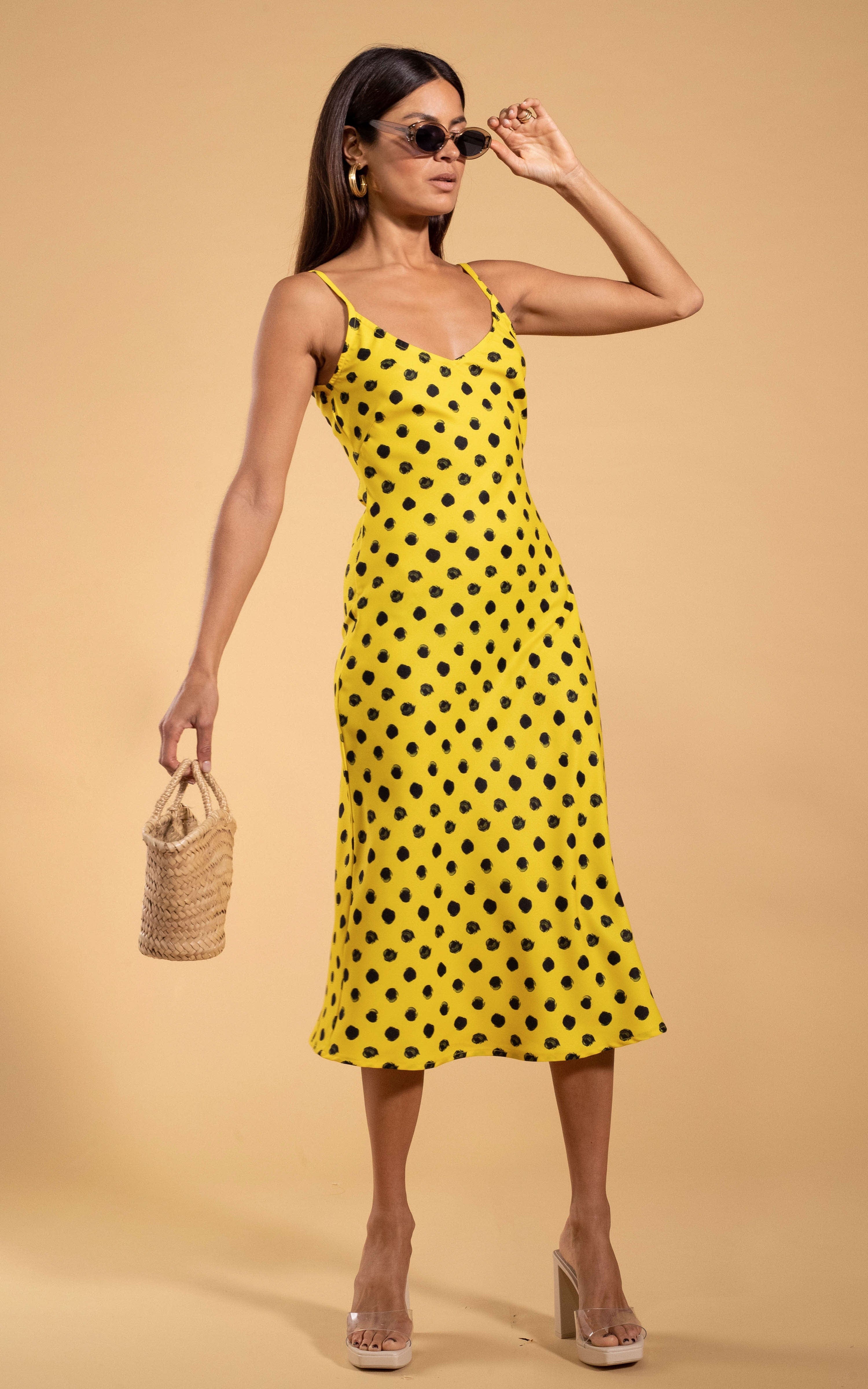model wearing Sienna Midaxi Dress in Yellow Polka Dot