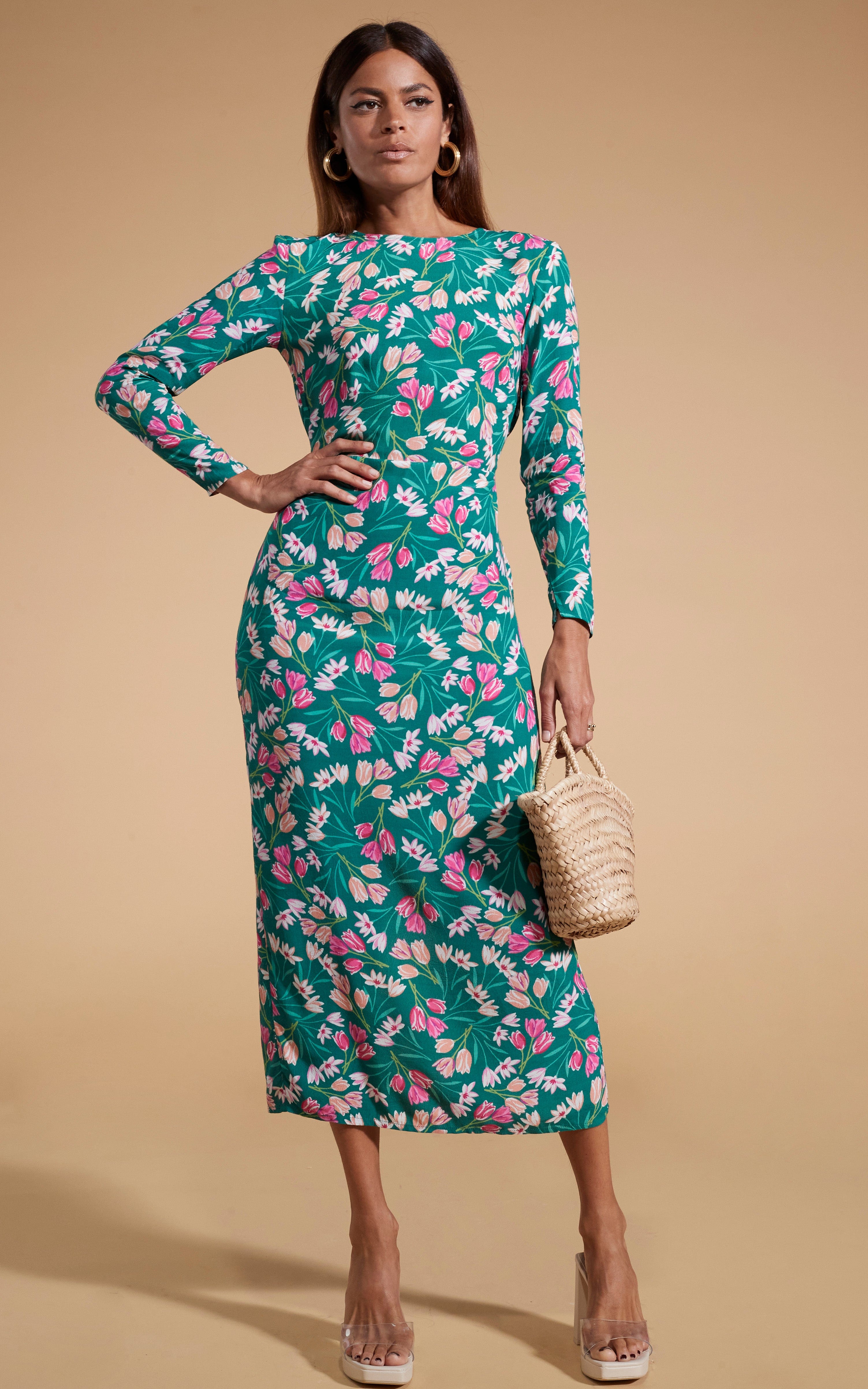 model wearing Estella Midaxi Dress in Green Tulip