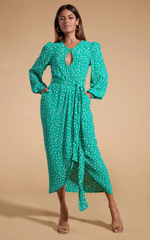 model wearing Mabel Midaxi Mock Wrap Dress in Odd Dot White on Sea Green