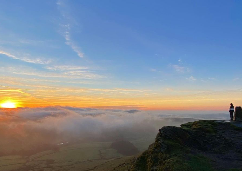 view from Shutlingsloe, Peak District, showing sun above the clouds