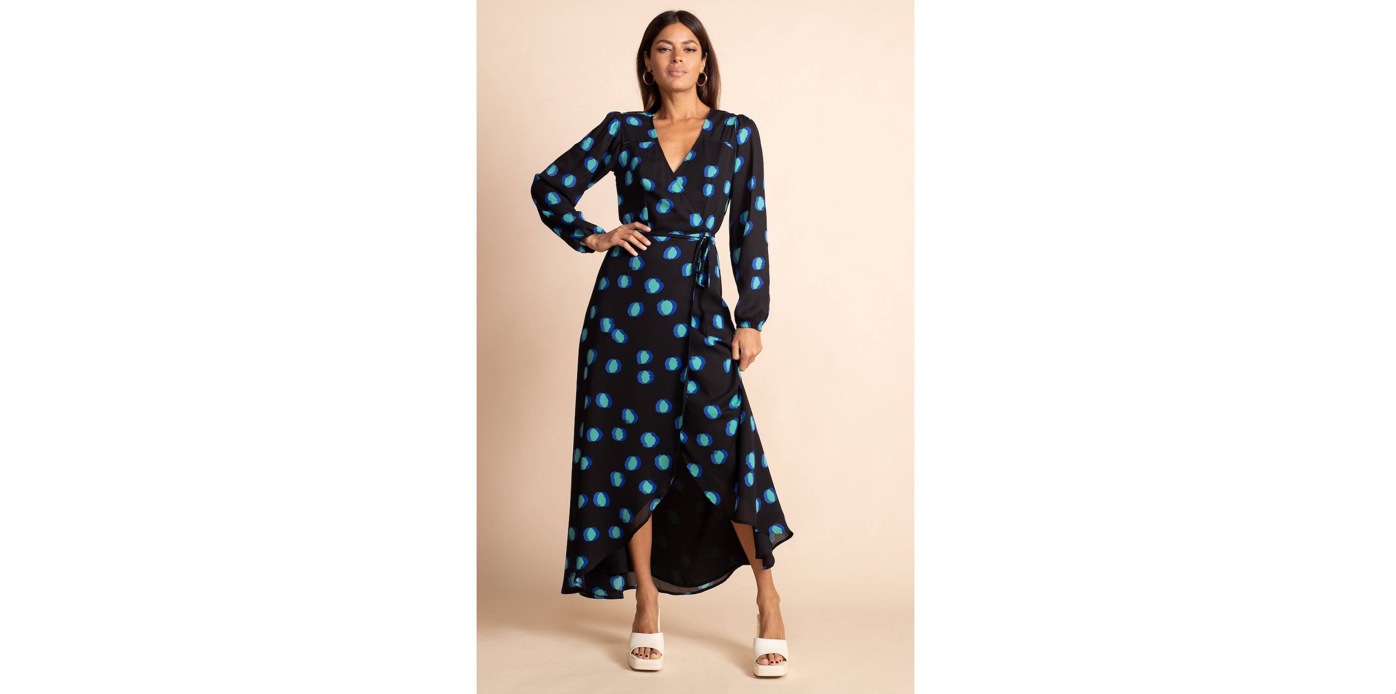 model wearing Jagger Maxi Dress in Polka Dot Blue On Black