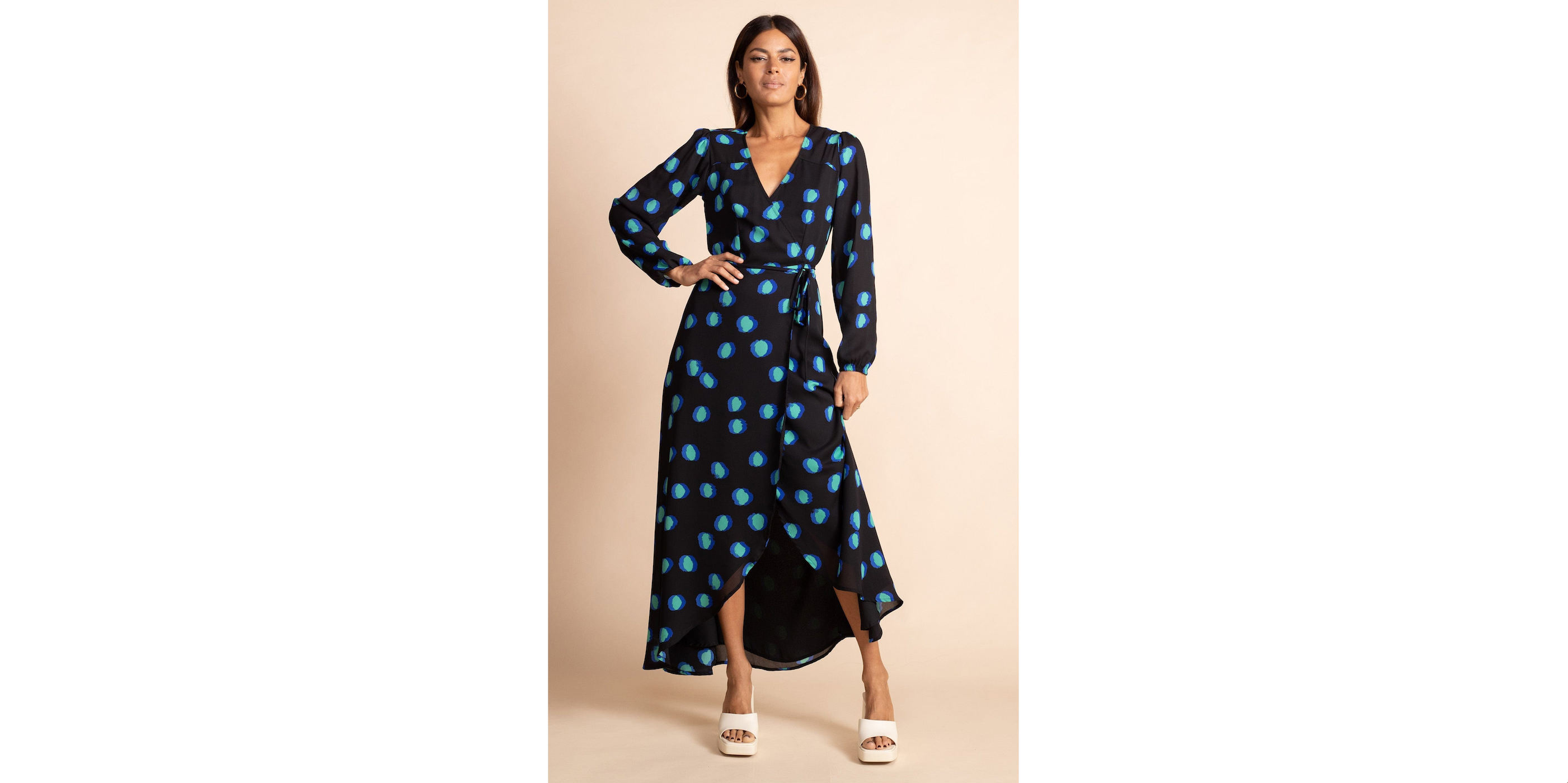 model wearing Jagger Maxi Dress in Polka Dot Blue on Black