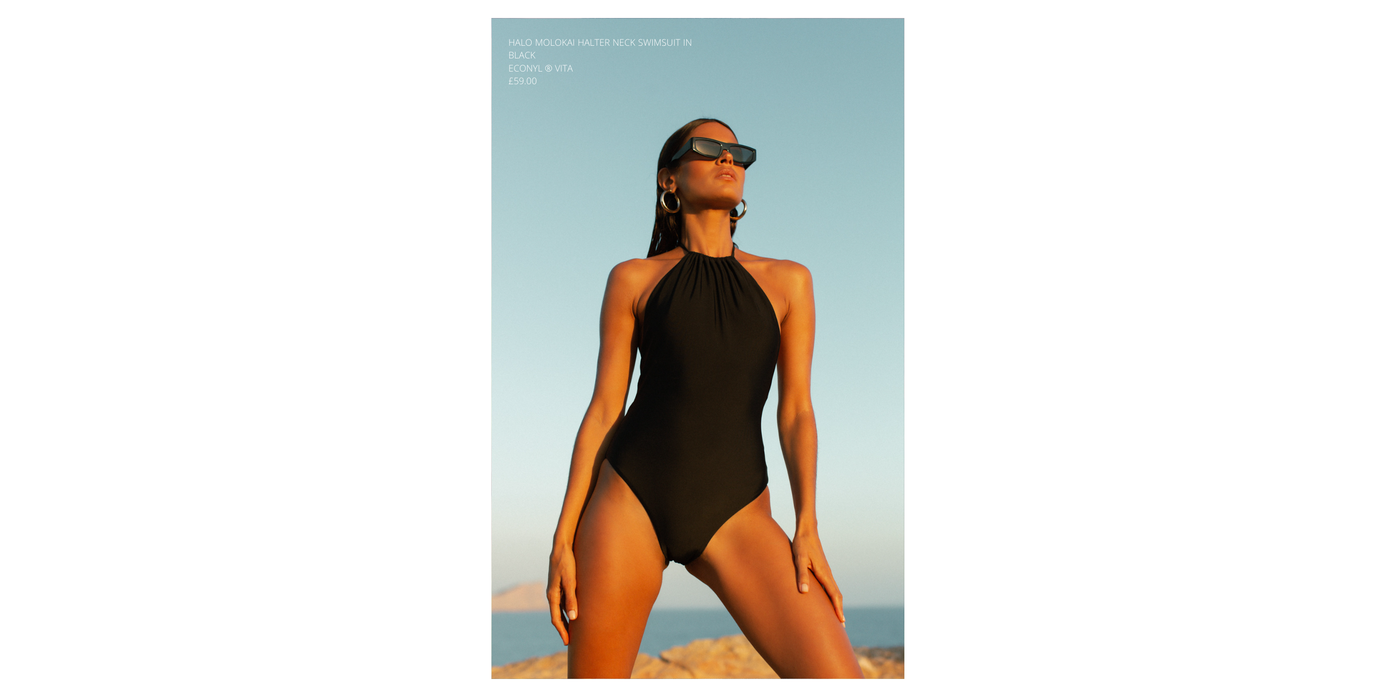 model wearing black HALO swimsuit with sunglasses