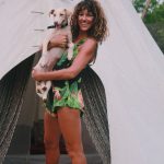 Tanya holding a dog at Wigwam