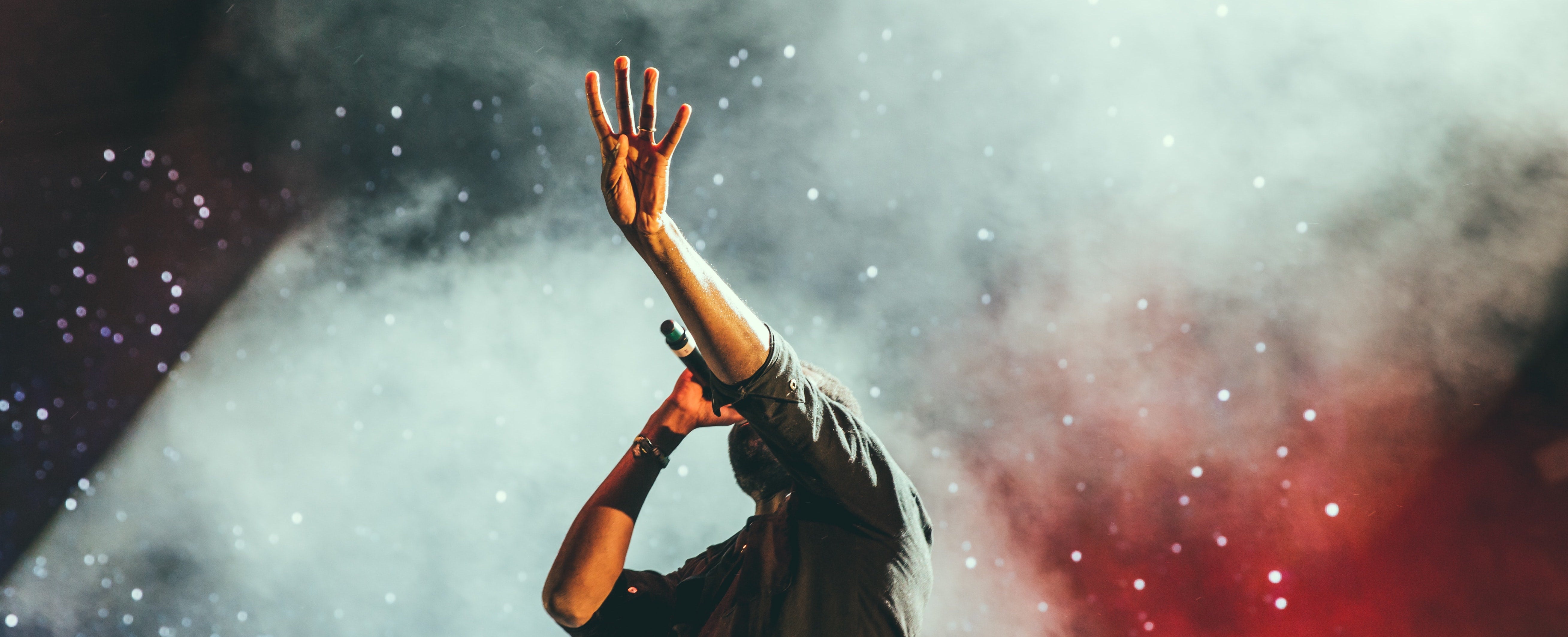 man singing at a live gig