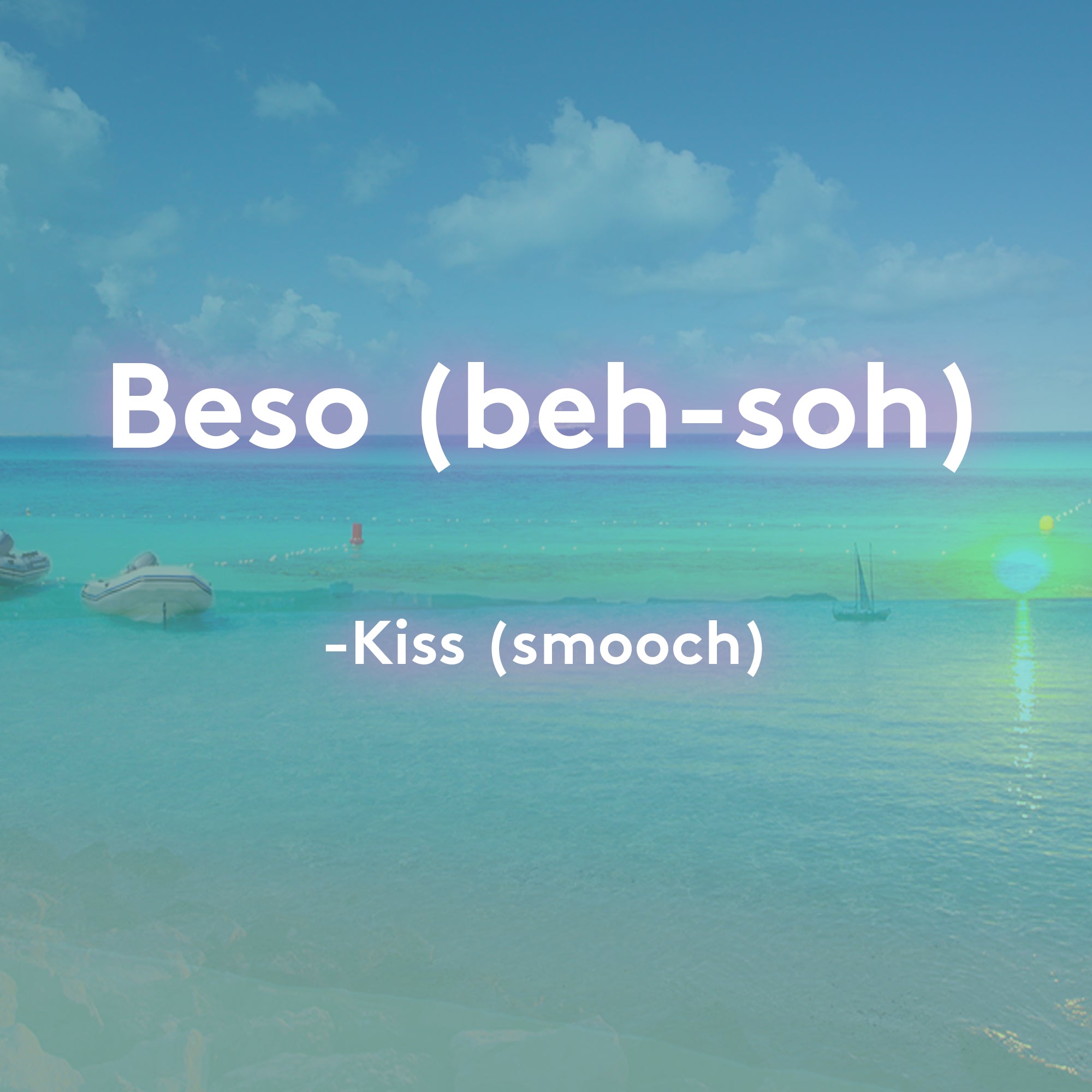 sea with text overlay of Spanish translation for kiss