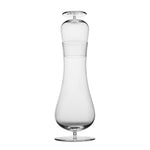 Mouth-blown glass decanter and tumbler. The Tumbler is made to fit into the opening of the decantur creating a sleek hour-glass shape.