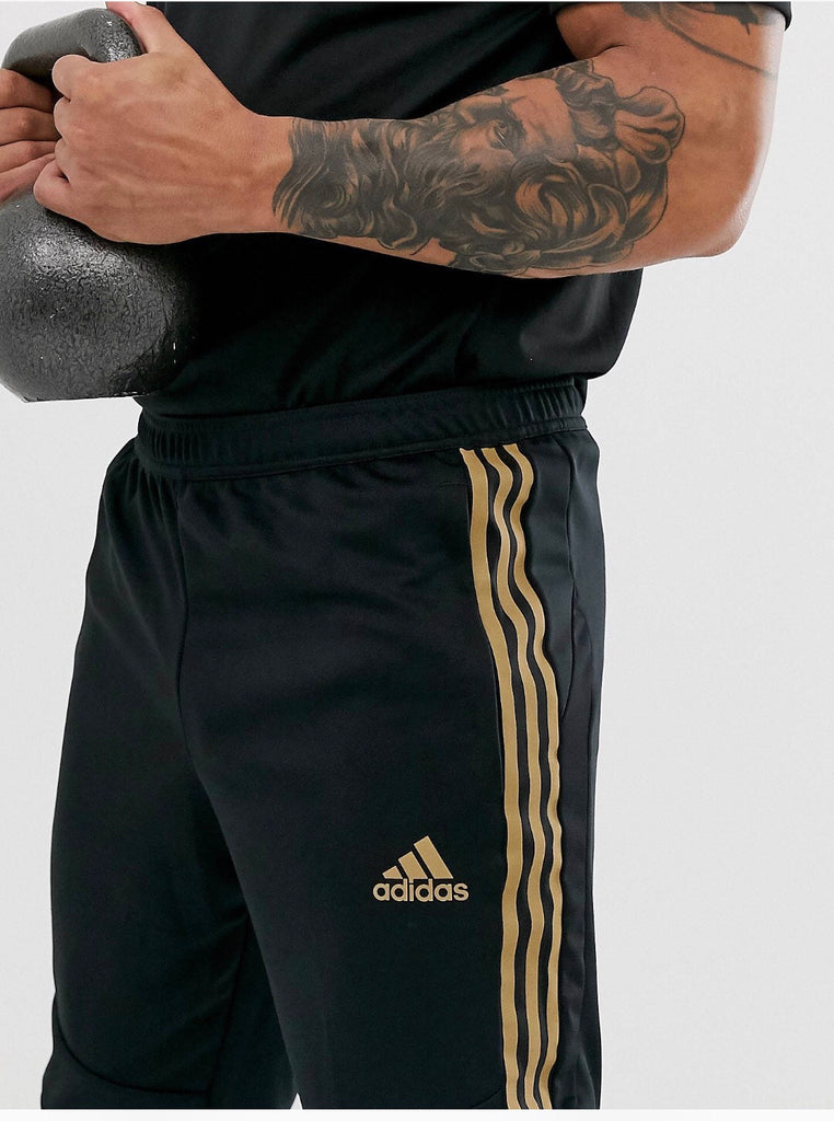 gold adidas sweatpants