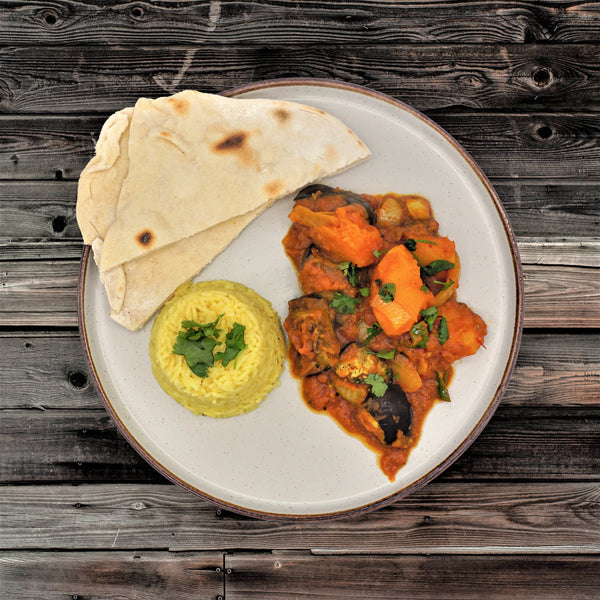 Plant based Butternut squash & aubergine bhuna served with pilau rice and chapatis