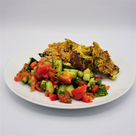 Shish spiced cauliflower fritters with seasonal veg and crunchy salad