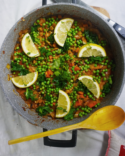 Vegetarian Paella with mushrooms, kale and peas