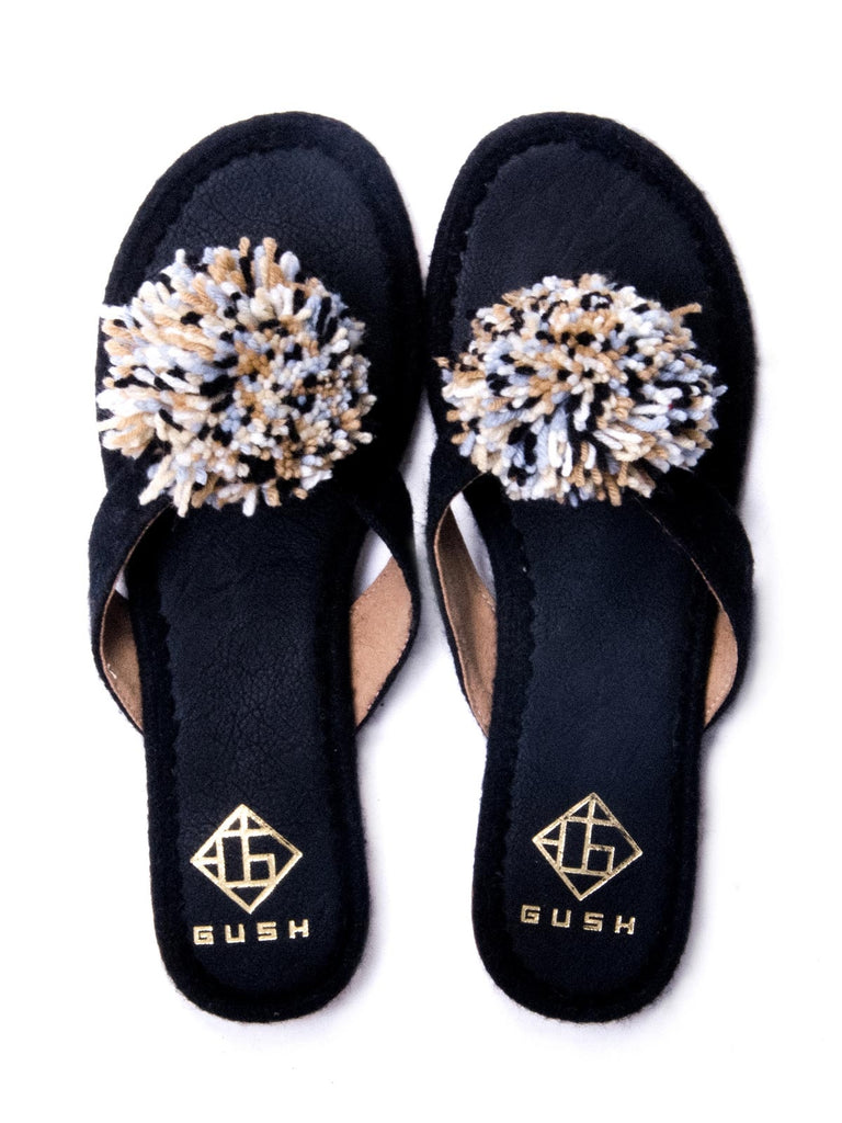 black pom pom flats