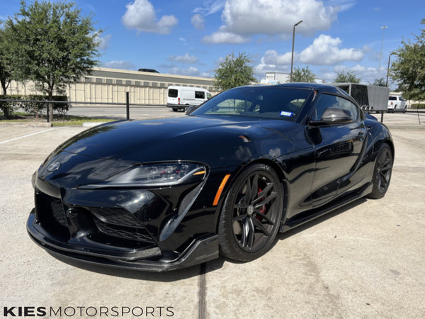 black a91 toyota supra with carbon fiber front lip and side skirt extensions