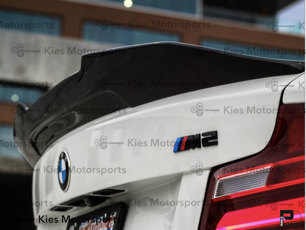 white m2 carbon fiber psm aggressive trunk lip closeup