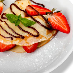 CREPES CON NUTELA Y FRUTILLAS