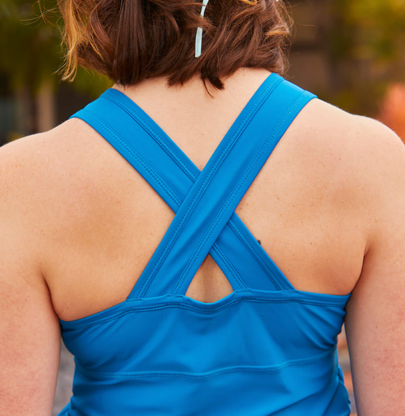 woman in a ruched swim scoop tank top