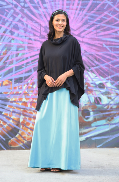 woman in a UPF shawl and sun dress